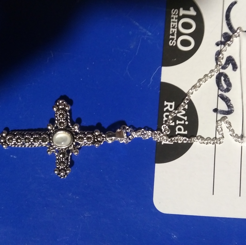 Silver cross necklace with moon stone